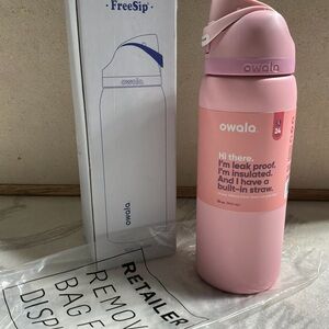 Owala rose quarts Insulated Water Bottle with Built-in Straw